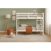 White Atlas Vicawu wooden bunk bed in decorated kids bedroom with warm colors and soft natural light