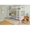 White wooden bunk bed with pull-out trundle in decorated kids room
