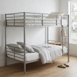 Practical and durable metal bunk bed. Divisible into 2 single beds. Ladder included. Full railing.